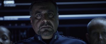 Movie still from “Ender's Game” (2013), directed by Gavin Hood – A person wearing a uniform; Close Up shot, Low angle