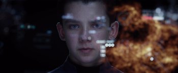 Movie still from “Ender's Game” (2013), directed by Gavin Hood – A young man looking out of a window at the camera; Close Up shot, Low angle