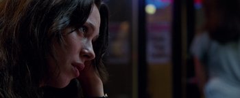 Movie still from “The Town” (2010), directed by Ben Affleck – A woman's face as she looks off into the distance; Close Up shot, Low angle