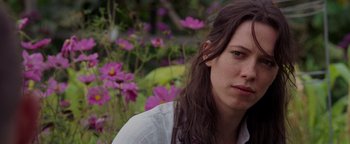 Movie still from “The Town” (2010), directed by Ben Affleck – A person with long hair; Close Up shot, Over the shoulder angle