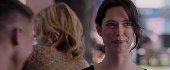 Movie still from “The Town” (2010), directed by Ben Affleck – A woman's face with another woman in the background; Close Up shot, Over the shoulder angle