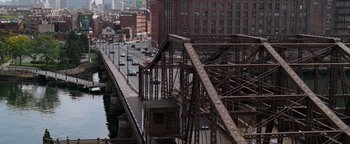 Movie still from “The Town” (2010), directed by Ben Affleck – An overhead view of a bridge and a busy street; Extreme Wide shot, High angle