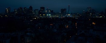 Movie still from “The Town” (2010), directed by Ben Affleck – A view of a city at night from a hill; Extreme Wide shot, High angle