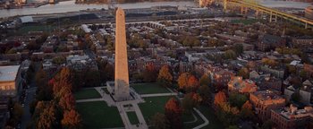 Movie still from “The Town” (2010), directed by Ben Affleck – An aerial view of the washington monument in washington , d; Extreme Wide shot, High angle