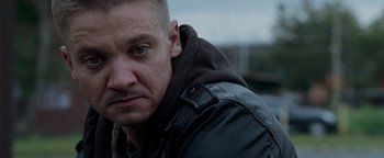 Movie still from “The Town” (2010), directed by Ben Affleck – A person wearing a leather jacket; Close Up shot, Over the shoulder angle