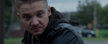 Movie still from “The Town” (2010), directed by Ben Affleck – A person wearing a leather jacket; Close Up shot, Over the shoulder angle