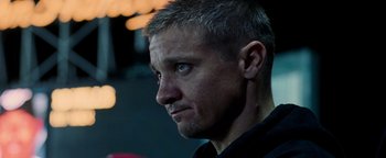 Movie still from “The Town” (2010), directed by Ben Affleck – A man's face in the dark; Close Up shot, Low angle