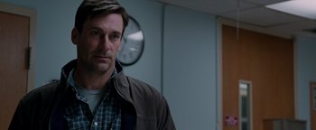 Movie still from “The Town” (2010), directed by Ben Affleck – A person wearing a jacket; Close Up shot, Over the shoulder angle