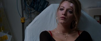 Movie still from “The Town” (2010), directed by Ben Affleck – A person wearing a black shirt; Close Up shot, Overhead angle