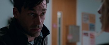 Movie still from “The Town” (2010), directed by Ben Affleck – A person looking at the camera; Close Up shot, Over the shoulder angle