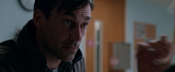 Movie still from “The Town” (2010), directed by Ben Affleck – A person wearing a neck tie; Close Up shot, Over the shoulder angle