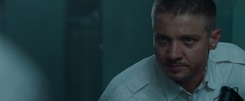 Movie still from “The Town” (2010), directed by Ben Affleck – A person wearing a white shirt; Close Up shot, Over the shoulder angle