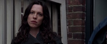 Movie still from “The Town” (2010), directed by Ben Affleck – A person with long dark hair; Close Up shot, Low angle