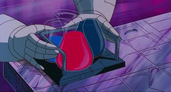 Movie still from “The Transformers: The Movie” (1986), directed by Nelson Shin – A cartoon of a person holding a red and a blue object; Extreme Close Up shot, Low angle