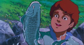 Movie still from “The Transformers: The Movie” (1986), directed by Nelson Shin – A fish and a boy in the background; Close Up shot, Low angle