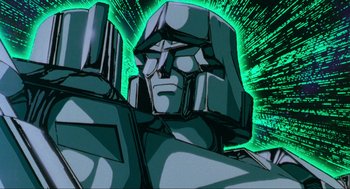 Movie still from “The Transformers: The Movie” (1986), directed by Nelson Shin – The head and shoulders of a robot; Close Up shot, Low angle