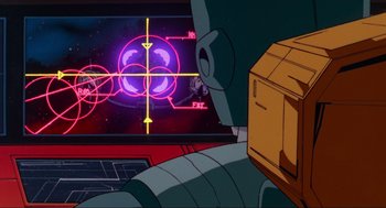 Movie still from “The Transformers: The Movie” (1986), directed by Nelson Shin – A computer screen with a computer screen with a picture of a space station in the background; Extreme Wide shot, Over the shoulder angle