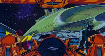 Movie still from “The Transformers: The Movie” (1986), directed by Nelson Shin – An image of an alien ship in the space; Extreme Wide shot, Low angle