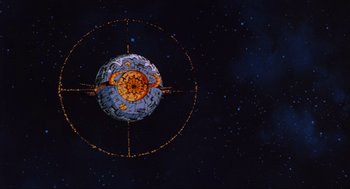 Movie still from “The Transformers: The Movie” (1986), directed by Nelson Shin – A star wars ship is shown in the night sky; Extreme Wide shot, Low angle