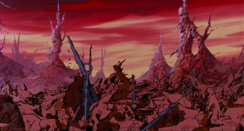 Movie still from “The Transformers: The Movie” (1986), directed by Nelson Shin – An image of an animated scene of a desert; Extreme Wide shot, High angle