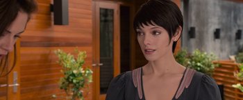 Movie still from “The Twilight Saga: Breaking Dawn - Part 1” (2011), directed by Bill Condon – A person with short black hair; Close Up shot, Over the shoulder angle