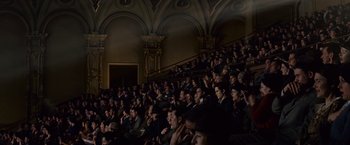 Movie still from “The Twilight Saga: Breaking Dawn - Part 1” (2011), directed by Bill Condon – A group of people sitting in a large auditorium; Extreme Wide shot, High angle