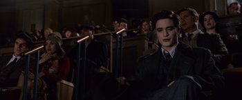 Movie still from “The Twilight Saga: Breaking Dawn - Part 1” (2011), directed by Bill Condon – A group of people sitting in front of a crowd; Medium shot, High angle
