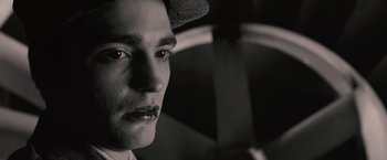 Movie still from “The Twilight Saga: Breaking Dawn - Part 1” (2011), directed by Bill Condon – A person wearing a hat; Close Up shot, Over the shoulder angle