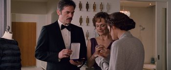 Movie still from “The Twilight Saga: Breaking Dawn - Part 1” (2011), directed by Bill Condon – A man and two women standing next to each other; Medium shot, Over the shoulder angle