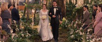 Movie still from “The Twilight Saga: Breaking Dawn - Part 1” (2011), directed by Bill Condon – A man and a woman are walking through a forest together; Wide shot, High angle