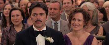 Movie still from “The Twilight Saga: Breaking Dawn - Part 1” (2011), directed by Bill Condon – A man and a woman standing next to each other in front of a crowd; Close Up shot, Over the shoulder angle