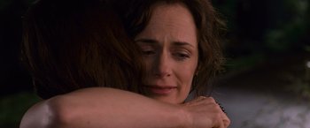 Movie still from “The Twilight Saga: Breaking Dawn - Part 1” (2011), directed by Bill Condon – A person hugging another person; Close Up shot, Over the shoulder angle