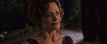 Movie still from “The Twilight Saga: Breaking Dawn - Part 1” (2011), directed by Bill Condon – A person wearing a purple shirt; Close Up shot, Over the shoulder angle