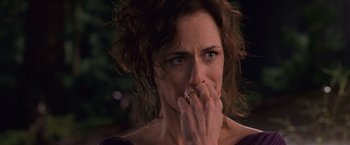 Movie still from “The Twilight Saga: Breaking Dawn - Part 1” (2011), directed by Bill Condon – A person holding their hand to her face; Close Up shot, Over the shoulder angle