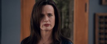 Movie still from “The Twilight Saga: Breaking Dawn - Part 1” (2011), directed by Bill Condon – A person with long dark hair; Close Up shot, Over the shoulder angle