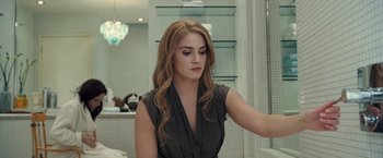 Movie still from “The Twilight Saga: Breaking Dawn - Part 1” (2011), directed by Bill Condon – A beautiful young lady sitting in front of a bathroom mirror; Close Up shot, Over the shoulder angle