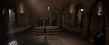 Movie still from “The Twilight Saga: Breaking Dawn - Part 1” (2011), directed by Bill Condon – A group of people sitting in chairs in a room; Extreme Wide shot, High angle