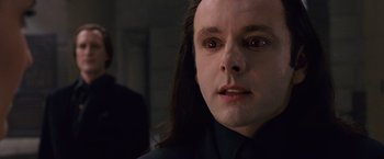 Movie still from “The Twilight Saga: Breaking Dawn - Part 2” (2012), directed by Bill Condon – A person with long black hair; Close Up shot, Over the shoulder angle