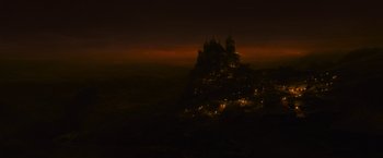 Movie still from “The Twilight Saga: Breaking Dawn - Part 2” (2012), directed by Bill Condon – A dark night with a castle on top of a hill; Extreme Wide shot, High angle