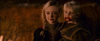 Movie still from “The Twilight Saga: Breaking Dawn - Part 2” (2012), directed by Bill Condon – A woman and a child are standing next to each other; Close Up shot, High angle