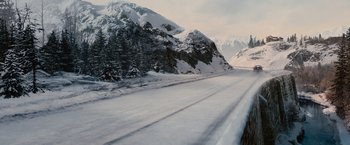 Movie still from “The Twilight Saga: Breaking Dawn - Part 2” (2012), directed by Bill Condon – A snowy road with a mountain in the background; Extreme Wide shot, High angle
