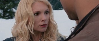 Movie still from “The Twilight Saga: Breaking Dawn - Part 2” (2012), directed by Bill Condon – A woman with blonde hair looking at the camera; Close Up shot, Over the shoulder angle