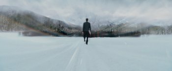 Movie still from “The Twilight Saga: Breaking Dawn - Part 2” (2012), directed by Bill Condon – A man in a suit is walking in the snow; Extreme Wide shot, High angle