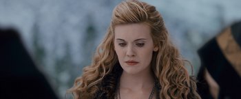 Movie still from “The Twilight Saga: Breaking Dawn - Part 2” (2012), directed by Bill Condon – A person with long blonde hair; Close Up shot, Over the shoulder angle