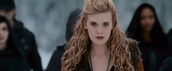Movie still from “The Twilight Saga: Breaking Dawn - Part 2” (2012), directed by Bill Condon – A person with long blonde hair; Close Up shot, Over the shoulder angle