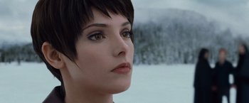 Movie still from “The Twilight Saga: Breaking Dawn - Part 2” (2012), directed by Bill Condon – A person with short black hair; Close Up shot, Over the shoulder angle