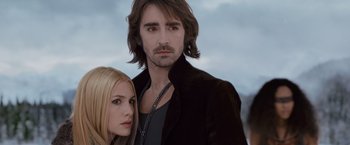 Movie still from “The Twilight Saga: Breaking Dawn - Part 2” (2012), directed by Bill Condon – A man and a woman standing next to each other; Close Up shot, Low angle