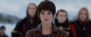 Movie still from “The Twilight Saga: Breaking Dawn - Part 2” (2012), directed by Bill Condon – A person with short hair; Close Up shot, Over the shoulder angle