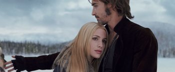 Movie still from “The Twilight Saga: Breaking Dawn - Part 2” (2012), directed by Bill Condon – A man and a woman standing next to each other; Close Up shot, Low angle