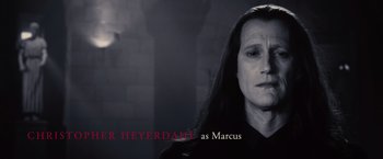 Movie still from “The Twilight Saga: Breaking Dawn - Part 2” (2012), directed by Bill Condon – A man with long black hair is looking at the camera; Close Up shot, High angle